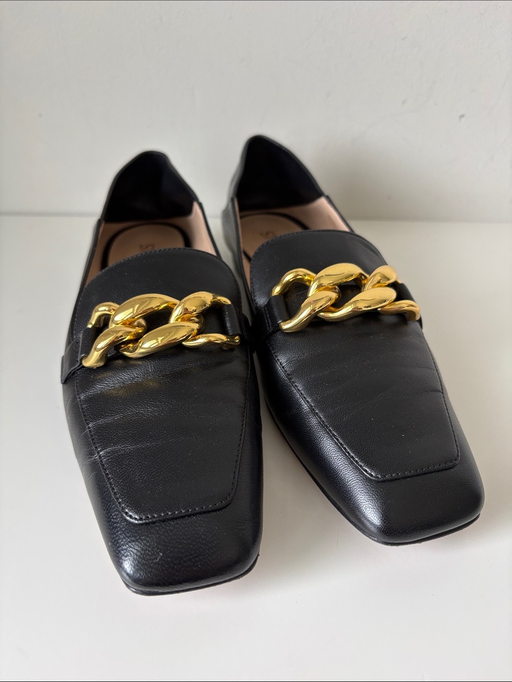 Stuart Weitzman blacks leather gold buckle loafers sz 7.5 preloved